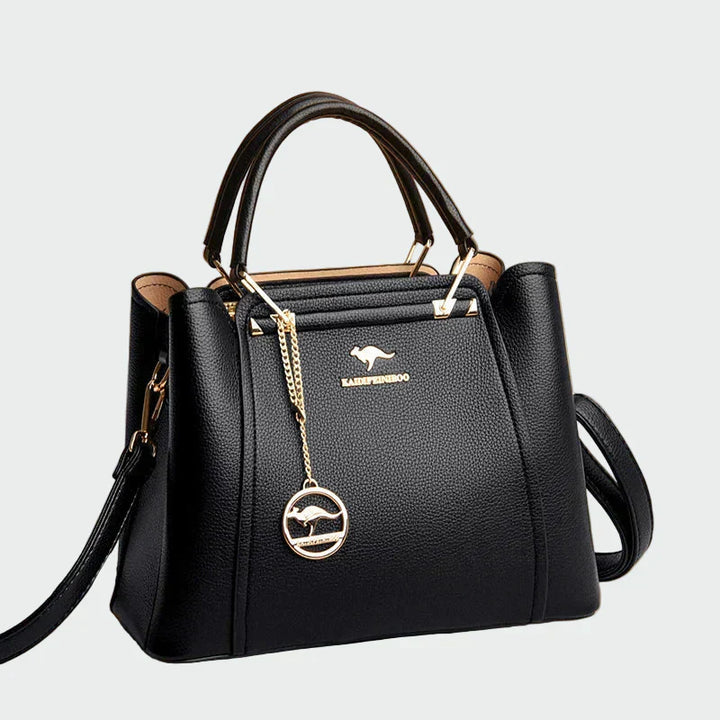 Sára | Elegáns fekete táska arany részletekkel