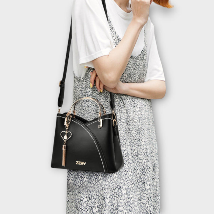 Jázmin | Elegáns táska arany részletekkel